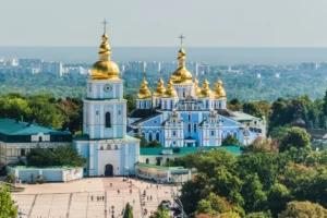 St Michael's Golden-Domed Monastery, Kyiv, with distinctive blue and white buildings topped by golden domes. Photograph by Gerry Lynch, 13 August 2017.